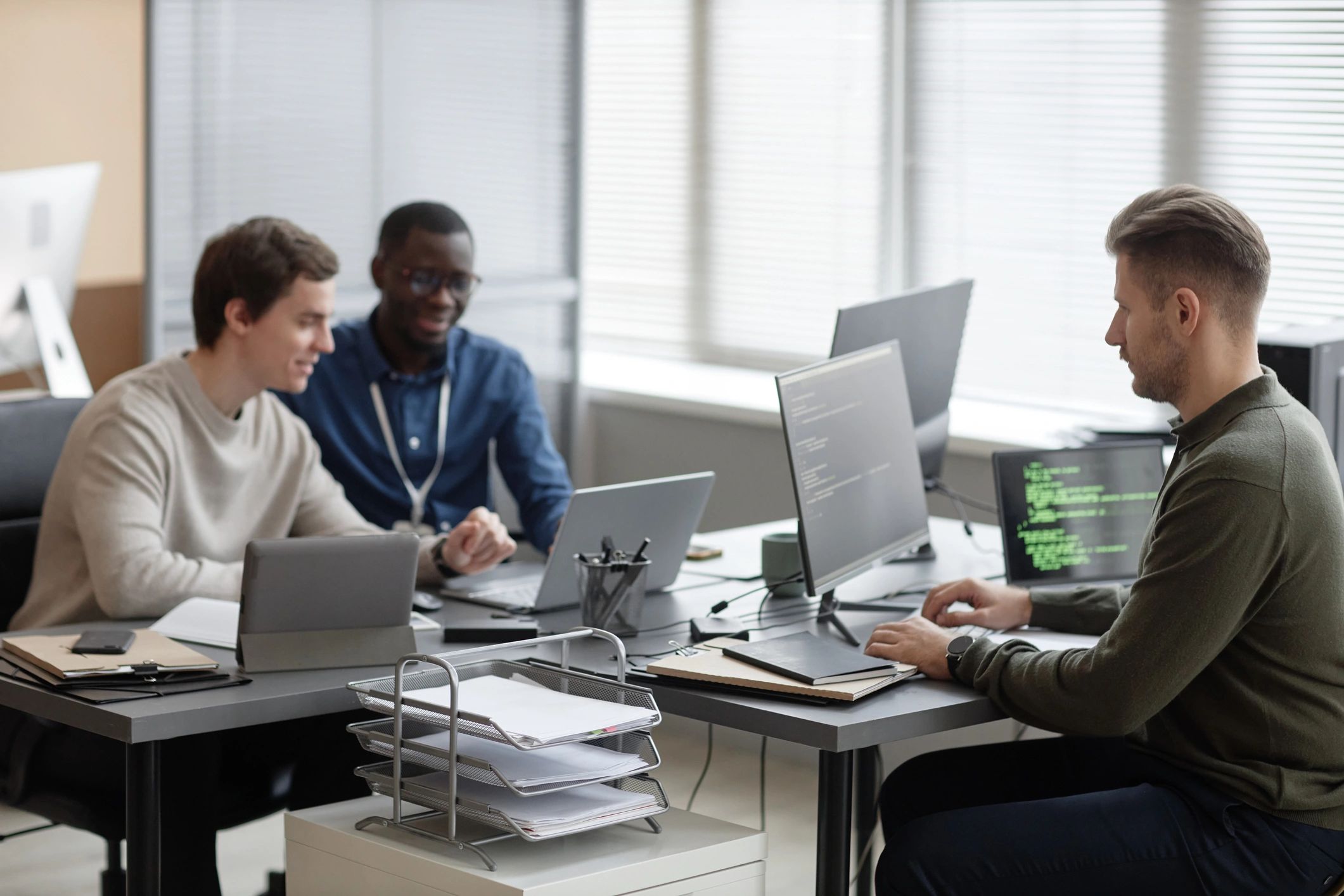 Cybersecurity team working in a monitoring office