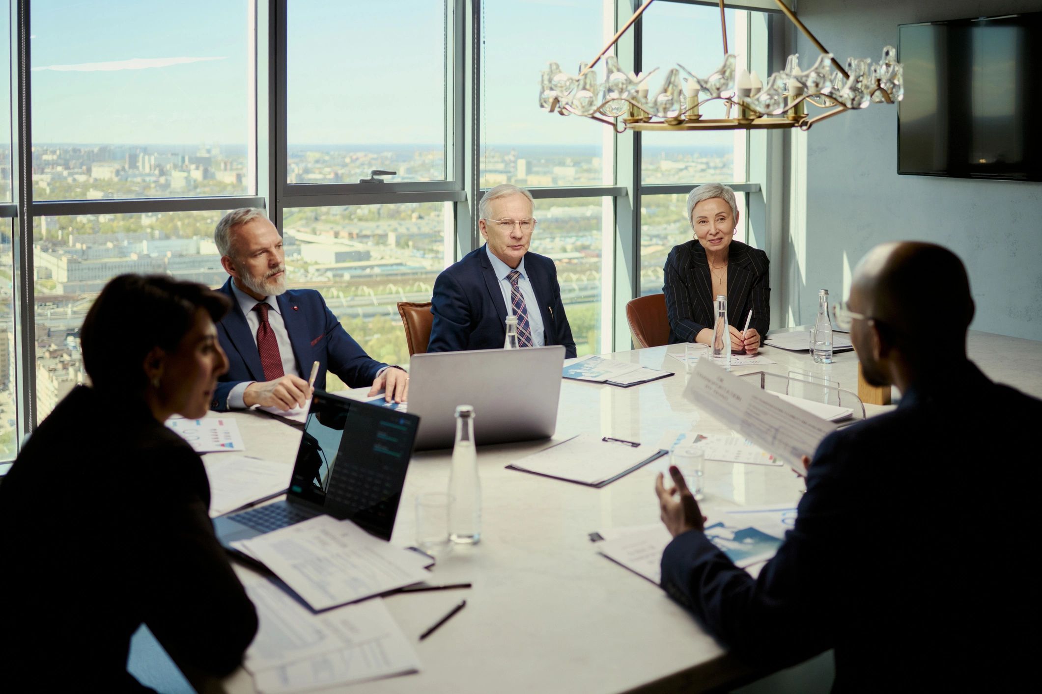 Professional team reviewing business documents