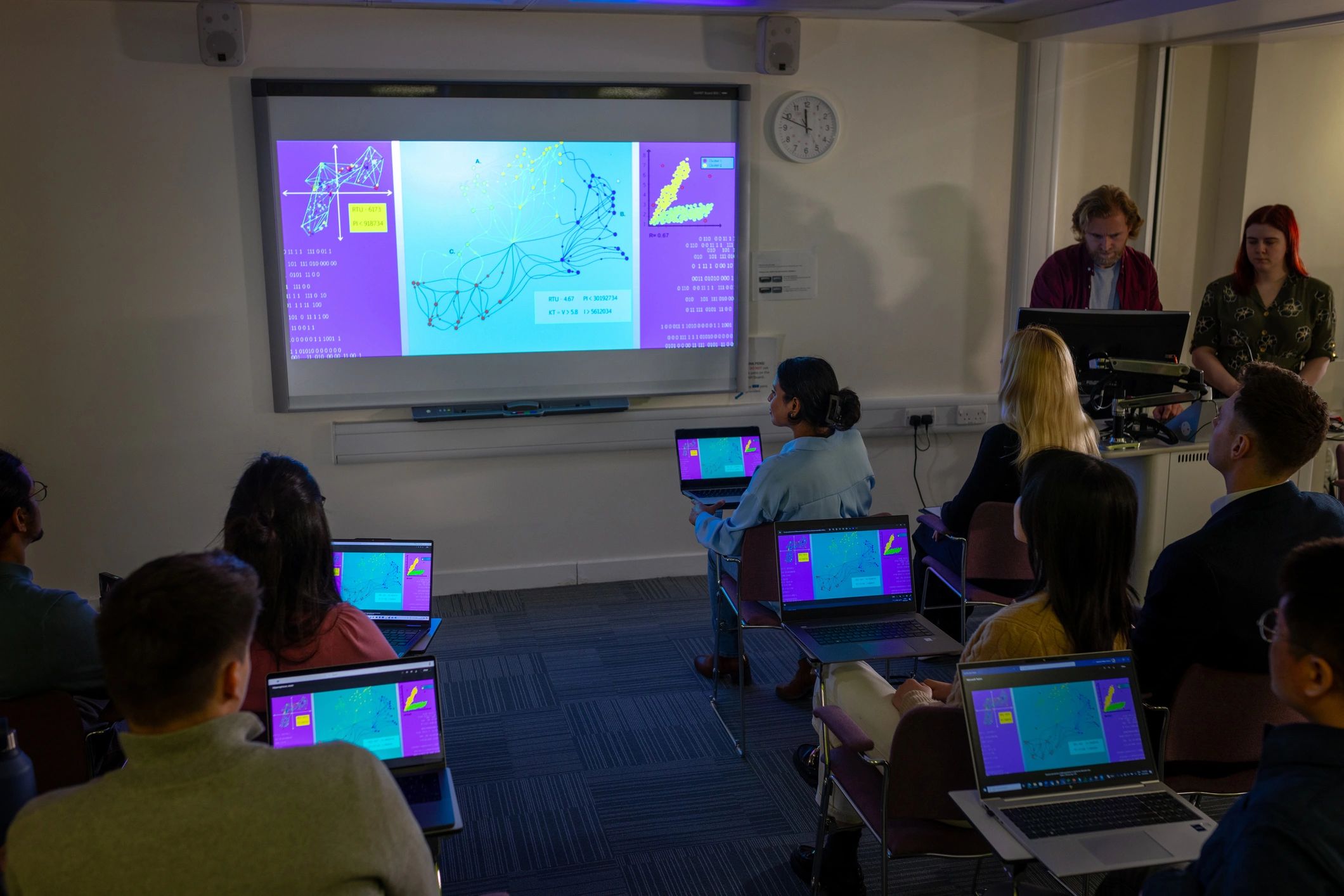 Technology training seminar with laptops